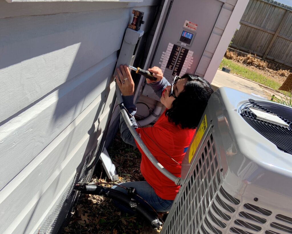 women in the industrial workforce installing HVAC