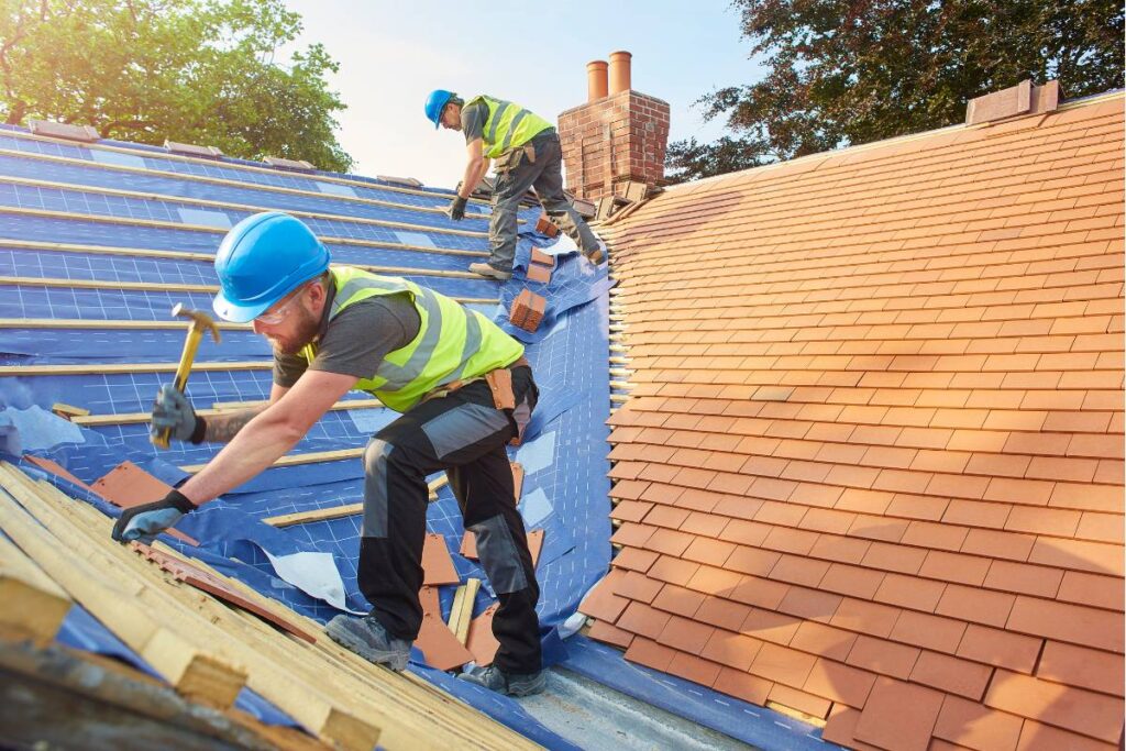 workers repairing a roof