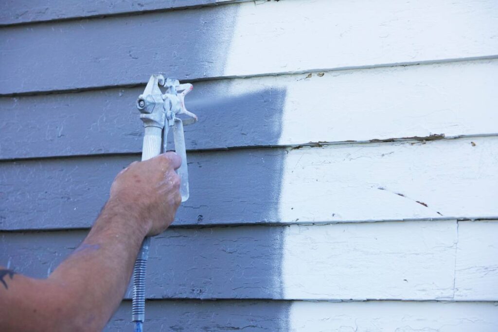 exterior house painting to prevent heavy rainfall damage